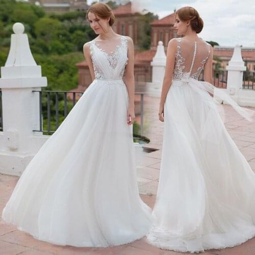 Unique V Neck Sleeveless Bridal Gowns 2021 A Line Floor Length Applique Tulle Beach Bohemian Bride Dresses Robe De Mariee Sleeve