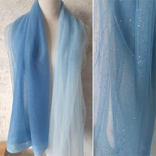 One meter high quality net yarn tissu Blue sky gradually changing gold powder fabric Dress wedding background decoration tissus