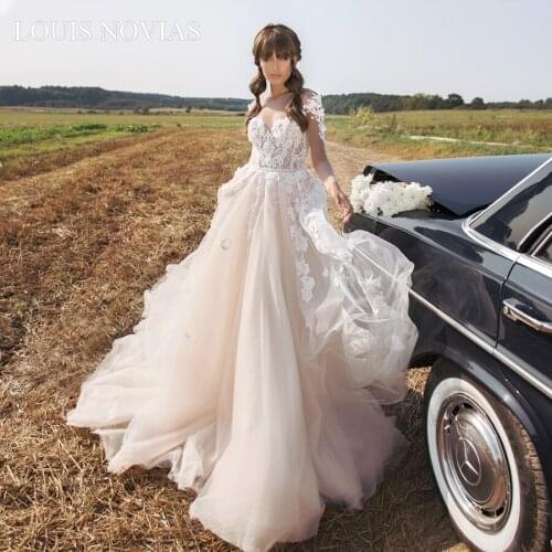 Louis Novias Lace Wedding Dress Embroidered Lace on Net Illusion Backless Court Train Wedding Frocks White Lvory Wedding Gowns