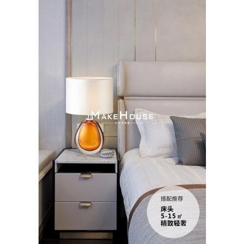 Light luxury decorative table lamp living room bedroom generation simple glass warm creative personality lamps