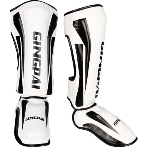 2021 Good Quality PU Leather MMA Shin Guards Black KickBoxing Instep Leg Protector Foam Gear for Martial Arts Sparring Muay Thai