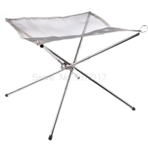 Camping with outdoor wood stove, stainless steel carbon stove, folding barbecue stove and fire rack