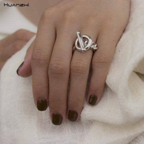 HUANZHI New 2019 Fashion Geometric One-button Chain Hollow Metal Hip hop Ring for Women Girls Party Simple Jewelry Gifts