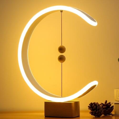 Magnetic suspension balance light absorption trill with web celebrity gift desk lamp marriage room of the head of a bed