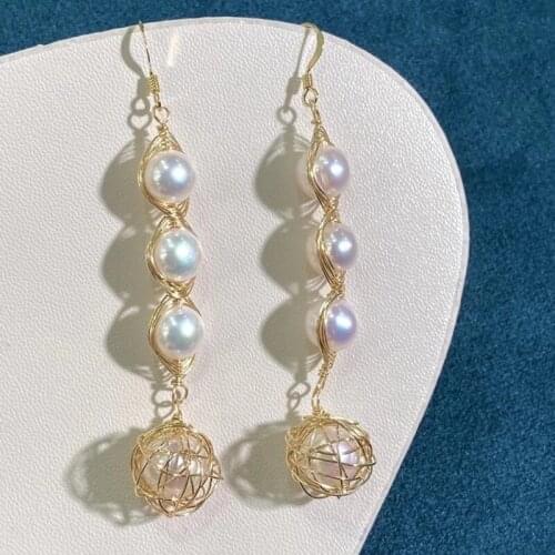 Dramatic long design high quality handcraft good luster natural white round pearl women cool earring wedding gift