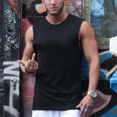 Muscleguys 2021 Solid Bodybuilding Sleeveless shirt Fitness Clothing Stringer Men Tank Top Muscle Vest Undershirt Tanktops