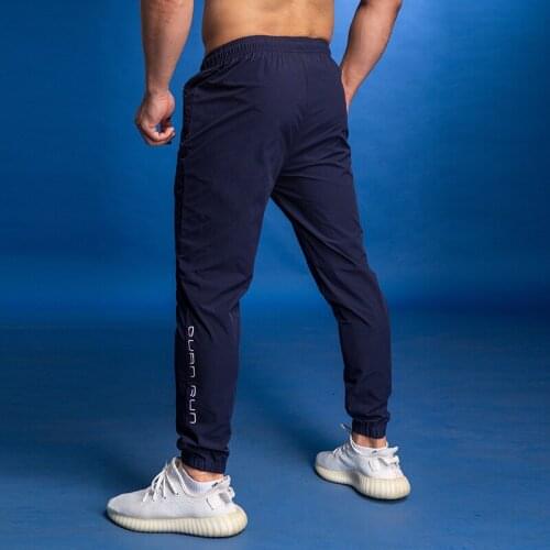 Mens Sports Fitness Pants Loose Leisure Fast Dry Sportswear Running Sports Pants Training Outdoor Jogging Pocket Zipper Design