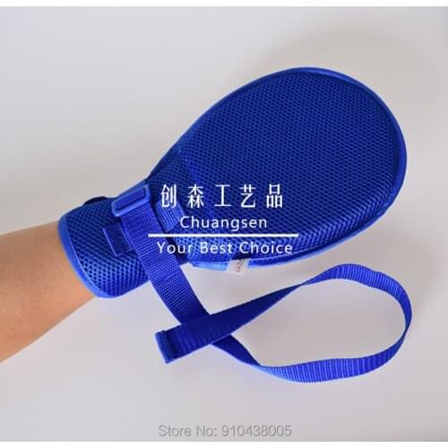 Patients lying in bed for the tube drawing against scratching wrist fixed constraint with constraint gloves