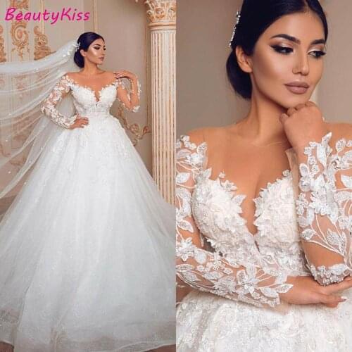 Modern Romantic Ball Gown Wedding Dresses Gorgeous Long Sleeve Lace Appliqued See Through Tulle Wedding Gowns Custom Size
