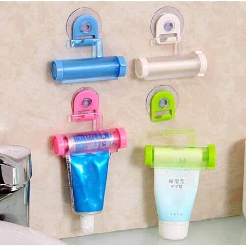 New Lovely Multi-Functional Toothpaste Squeezer Hanging Plastic Rolling Tube Manual Squeezer Toothpaste Dispenser New