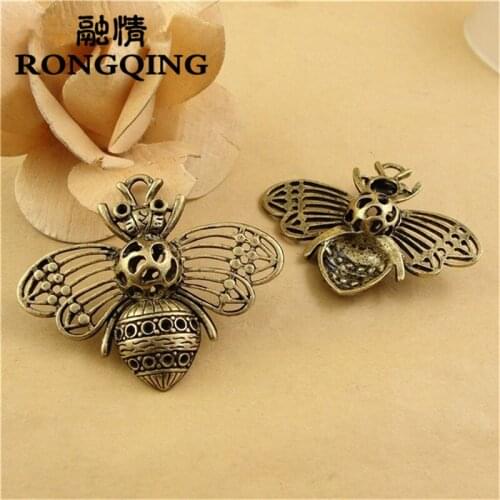 RONGQING 10pcs/lot 57*48MM Cute Hollow Bees Charms 3D Insect Pendant Jewelry Findings for Handmade DIY