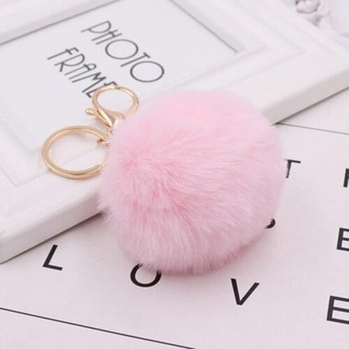 Fashion metal cute autumn and winter fur ball cartoon keychain creative bag mobile phone car plush pendant fun keychain