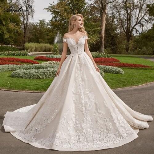 Alonlivn Whole Appliques Lace A-Line Wedding Dresses Sweetheart Illusion Back With Button Luxury Lace Bridal Gowns