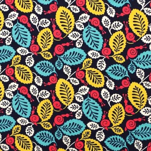 1 yard Cotton Woven Fabric - Leaves and snail on black background (width=145cm)