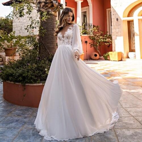 Bohemian Wedding Dress 2021 A-Line Sheer Neck Long Sleeve Lace Appliques Button Sweep Train Vintage Bride Gown Robe De Mariée
