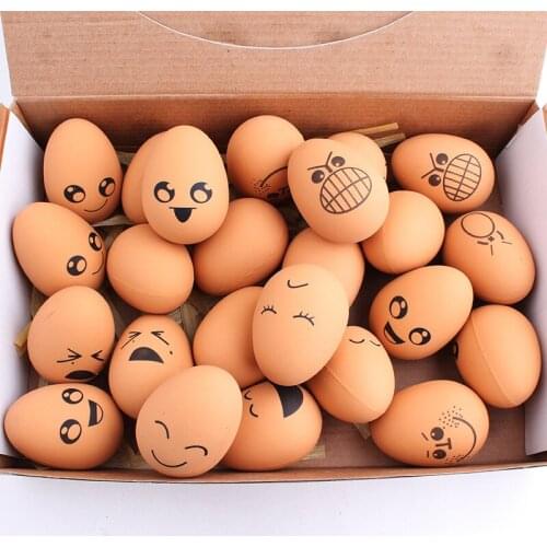 Wholesale Pet Expression Egg Shaped Elastic Ball 5.6cm Rubber Gnawing Expression Egg Toy Ball Pet Toy-007