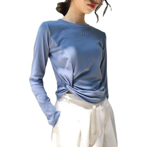 Spring and autumn Korean loose solid color knotted long sleeve T-shirt womens short top women sexy tops