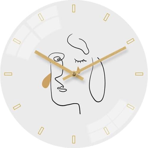 Modern simple art office decorative wall clock Creative abstract character white living room wall clock