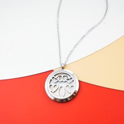 European and American retro fashion trendy men and women hollow love clavicle chain pendant