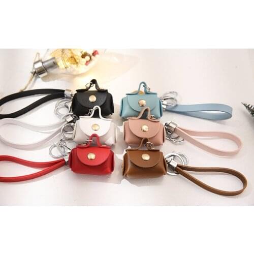 Hot selling mini PU storage bag earphone bag PU leather coin purse for keychain lovely storage bag mini size