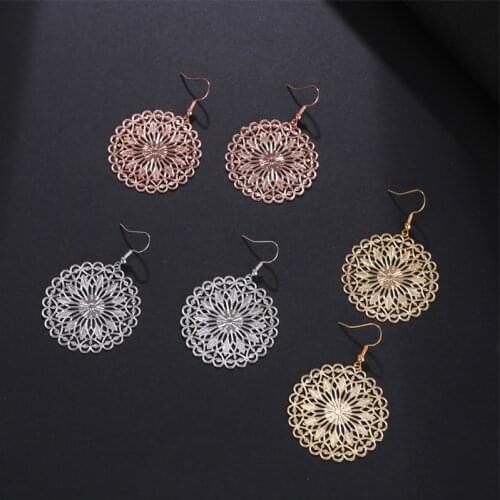 Fashion retro bohemian hollow carved flower shape Ear Rings geometric pattern earrings women Retro Hanging Earrings