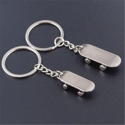 Hot creative dance party gift scooter key chain couple car key pendant bag hanging ornaments can be Color