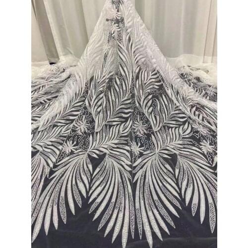 The new glitter comes on the market with beads and big flower position viscose African fabric lace, suitable for fashionable