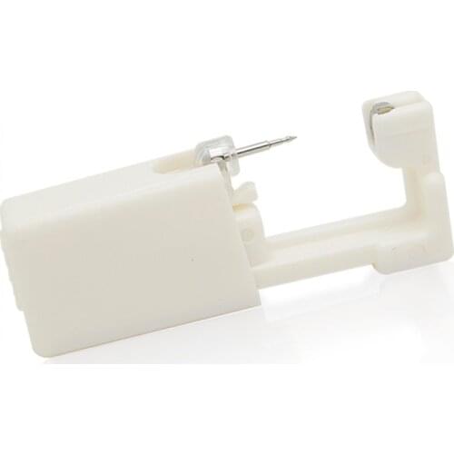 1PCS Disposable Sterile Safety Nose Ear Piercing Unit Cartilage Tragus Helix Piercing Gun Tool Kit Build In Ear Studs Earring