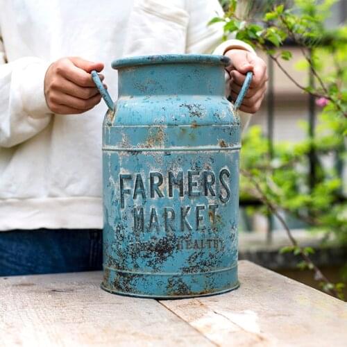 Rustic blue metal milk can flower arrangements