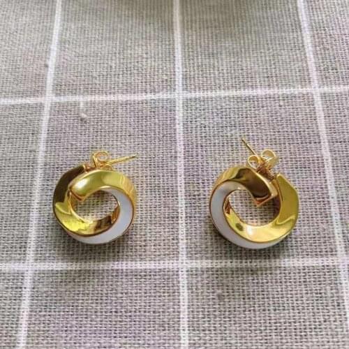 New earrings European and American geometric ring earrings temperament female brass irregular spiral earrings