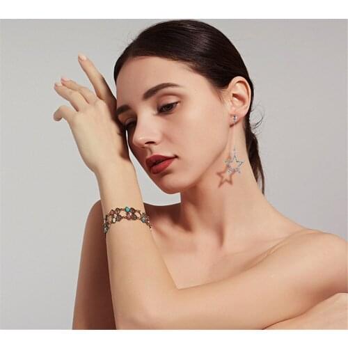 CRLEY Simple fashion Silver plated star earrings for women fashion rhinestone hollow drop earrings jewelry long earrings girls