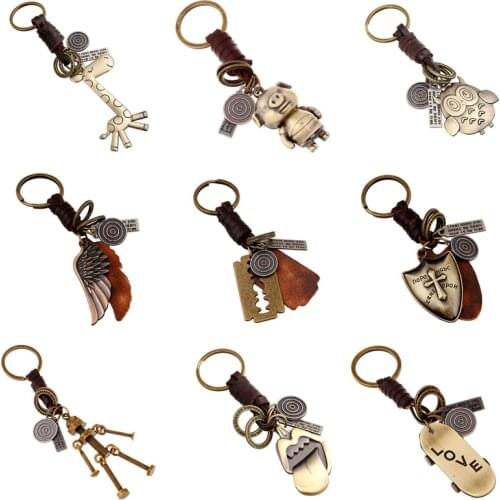 Modyle 2020 New Genuine Leather KeyChain Punk Rock Vintage Animal Feather Robot Key Chains for Man Woman Jewelry Gifts