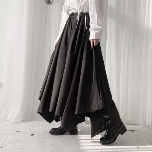 Yamamoto designs dark wind trousers for women, irregular culottes for women, loose leg trousers for women, black trouser skirts
