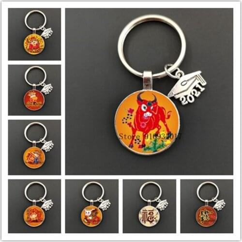 2021 year of the ox cartoon ox round glass keychain new year ox year round glass keychain creative blessing glass key ring gift