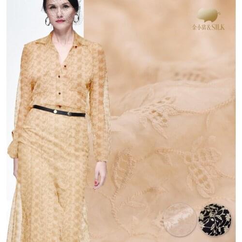 Soft beauty silk along the embroidery fabric along embroidery silk fabric hollow transparent lace fabric wholesale silk cloth