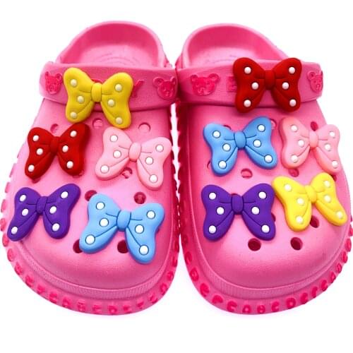 100PCS Wholesale Mix Bow-knot Tie Icon Shoes Charms Cartoon Decoration For Wristband Croc Jibizt Girls X-MAS Gifts Accessories