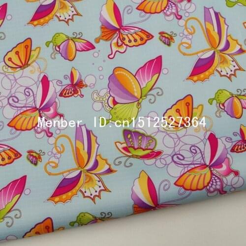 140cmx50cm PVC coated waterproof fabric - butterfly on light blue background (WF085)