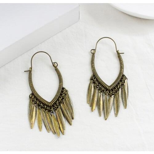 Metal winding irregular hollow shape hanging metal pointed tassel big earrings female ornament with clothes fashion trend