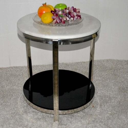 Small round tea table marble. Stainless steel. The sofa side table