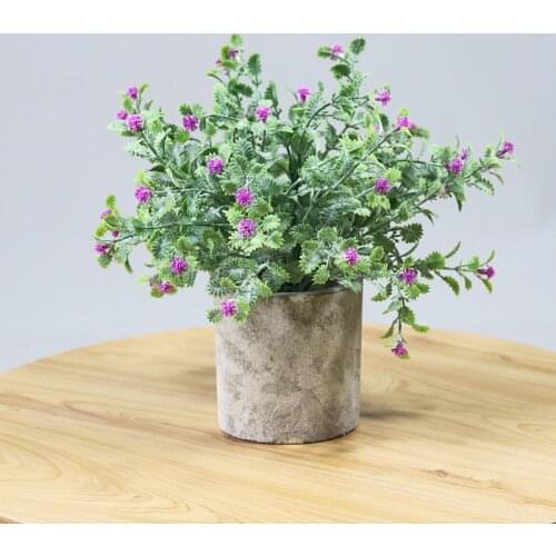 Artificial potted babysbreath fake bonsai false blossom Green plants on the desktop of bookcase