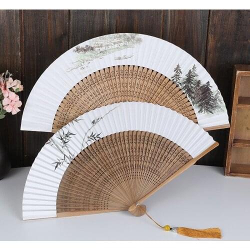 New Chinese elegant solid wood printed rice paper fan is simple, elegant and unpretentious paper hand fan folding hand fans