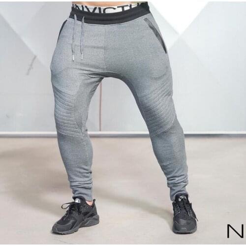 NEW 2021 Spring Autumn Casual Stretch Muscle Fitness Elastic Waist stripe way hip hop joggers Harem trousers leg cargo pants