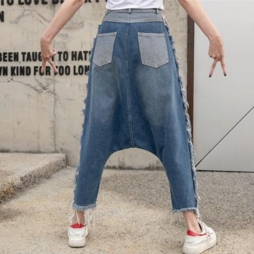 New Women Washed Loose Fit Hip Hop Ripped Denim Harem Pants High Street Female Fashion Pencil Jeans Cross-Pants Trousers