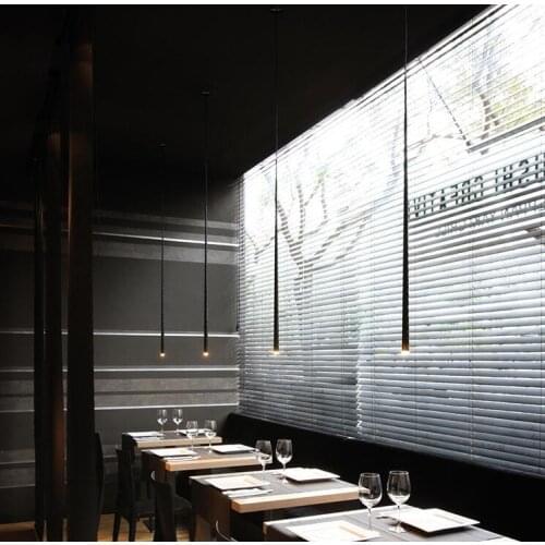 Tapered strip metal simple staircase lifting space combination sales office model room chandelier led compound staircase lamp