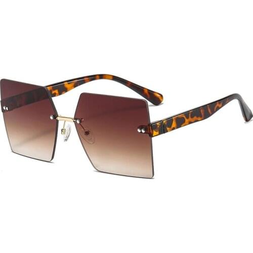 2021 Luxury Design Classic Trend Frameless Color Sunglasses Men And Women Box Personality Retro Gorgeous Fashion Glasses