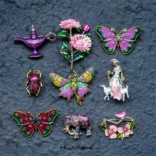HUANZHI 2020 New Vintage Metal Zircon Purple Butterfly Daisy Insect Elephant Animal Plant Brooch for Women And Man Jewelry Gift