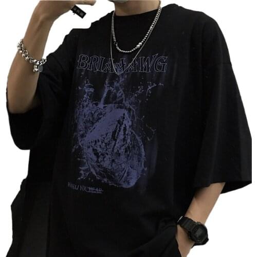 The trend is dark black graffiti letter-printed round collar short sleeve T-shirts for men and women