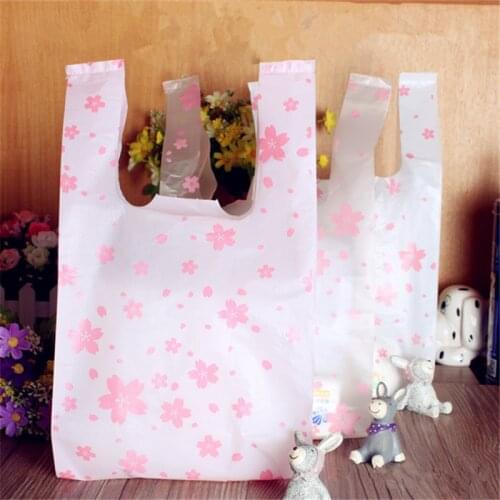 100Pcs/Lots Sakura Plastic Carrier Bags Plastic Shopping Packing Bag With Handles 15*28CM Free Shipping