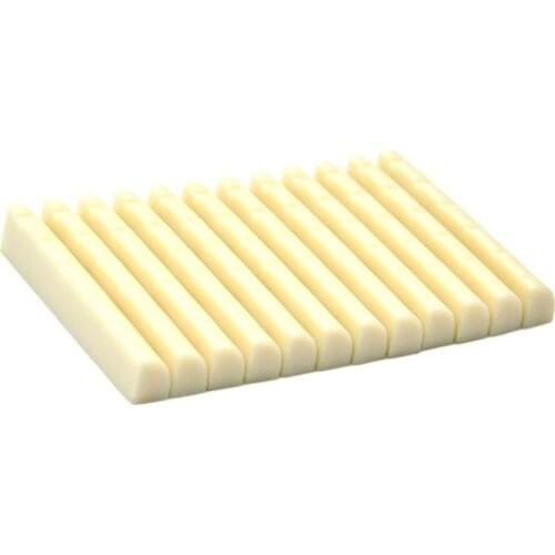 50pcs Universal Acoustic Guitar Bridge Upper Nut Saddles Plastic Ivory White