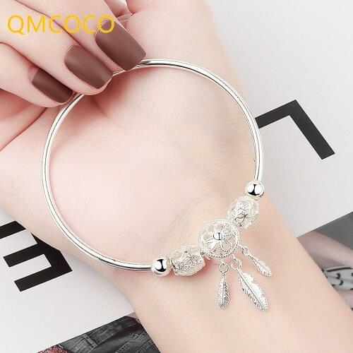 QMCOCO Creativity Design Dreamcatcher 925 Silver Bracelet Simple Hollow Out Feather Pendant Fashion Delicate Jewelry For Woman